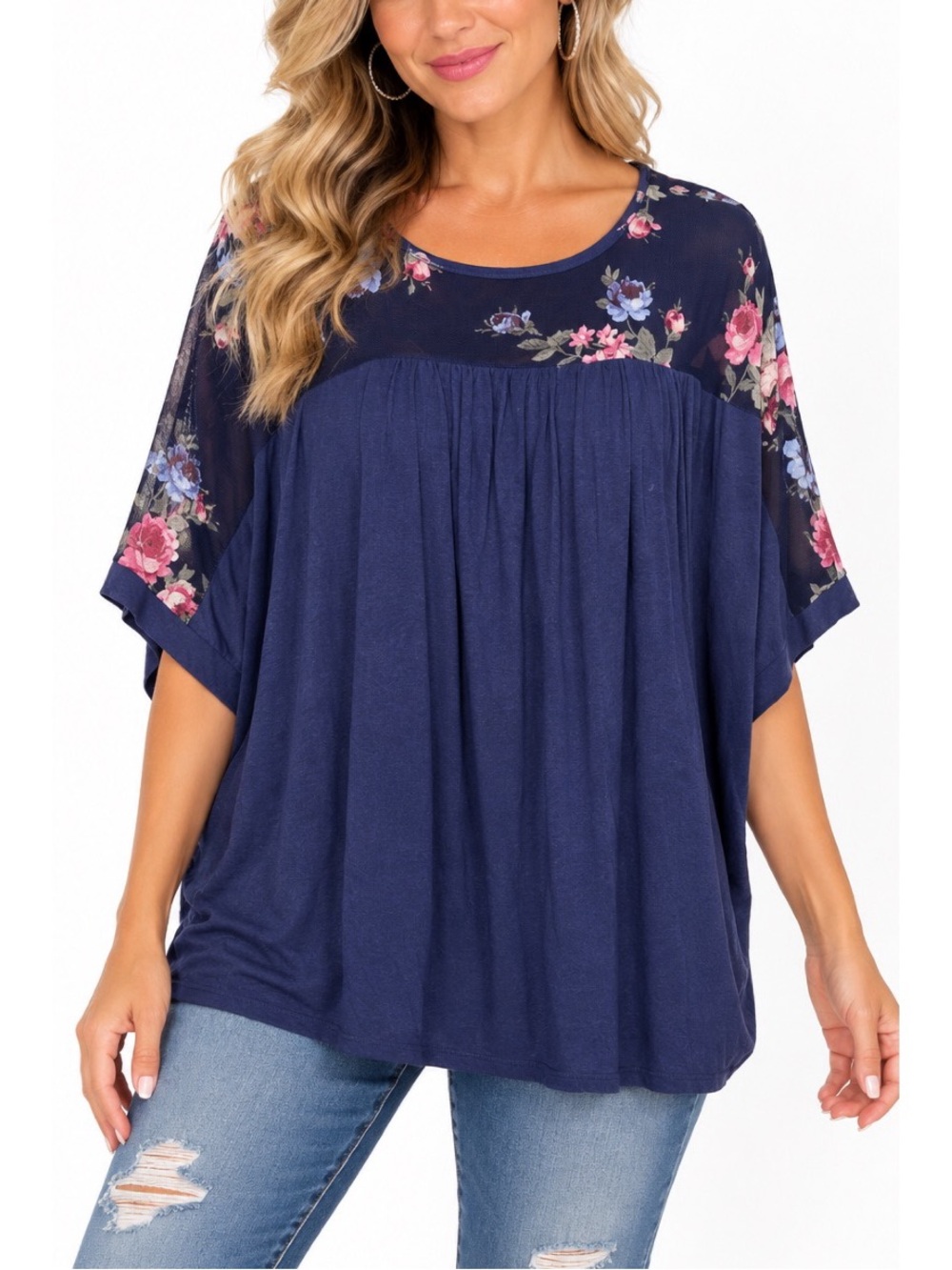 Oddy navy blue blouse features a flowy, relaxed silhouette